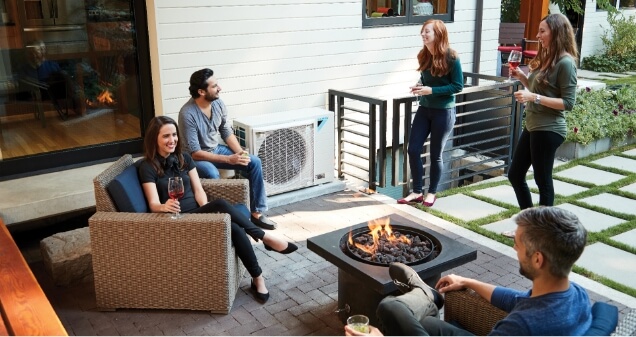 Group of people socializing on a patio