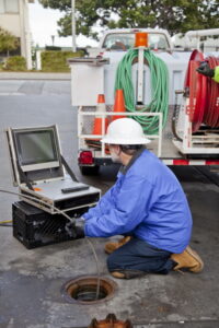 plumber-using-a-hydro-jetting-machine