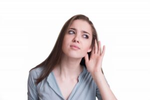 woman-listening-to-a-strange-sound-from-her-furnace