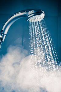 steaming-water-pouring-from-a-showerhead